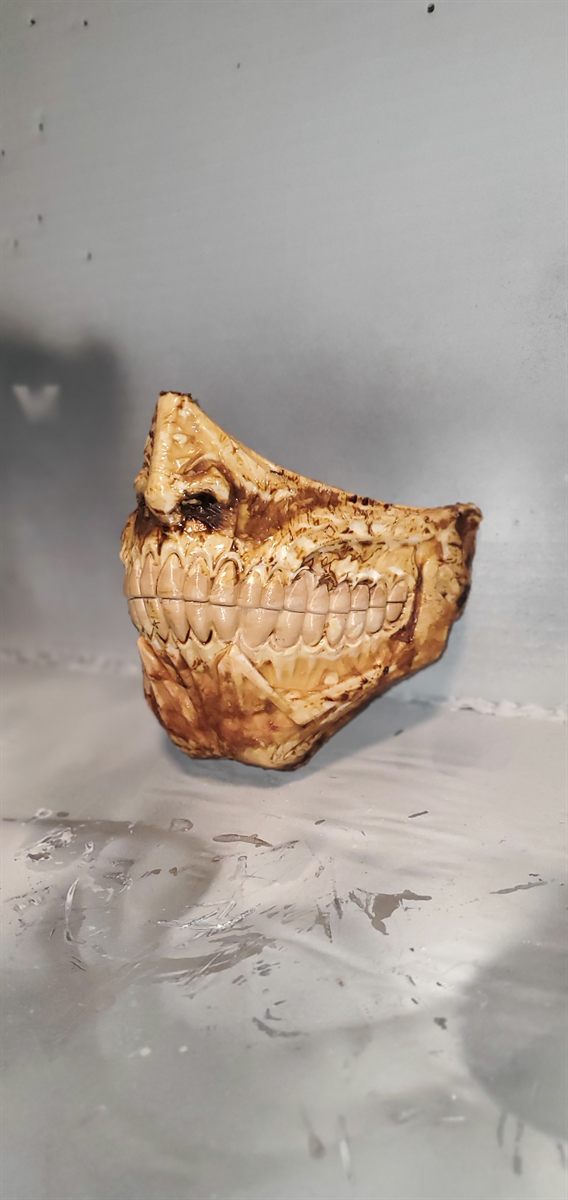 Oni mask painted with a weathered bone finish